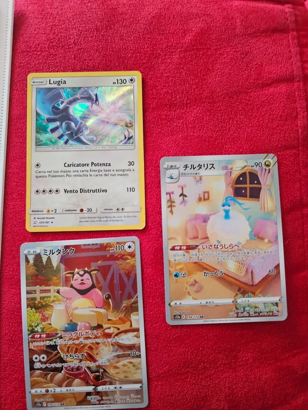 3 carte pokemon come in foto