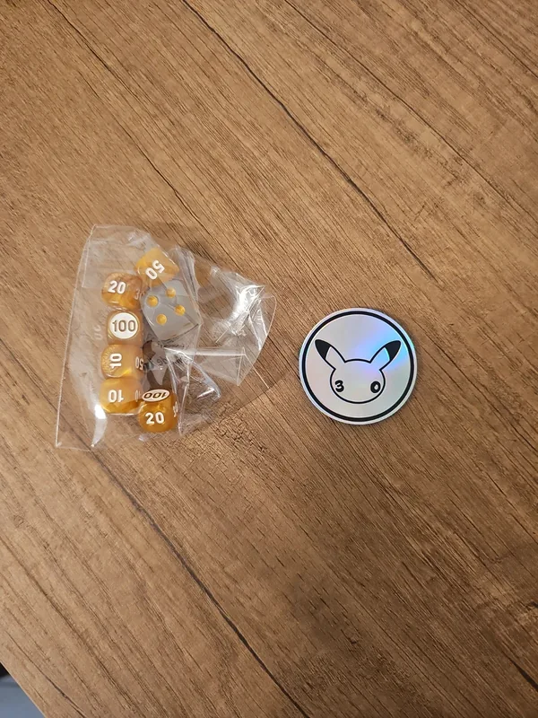 Set dadi e moneta 30th anniversario pokemon